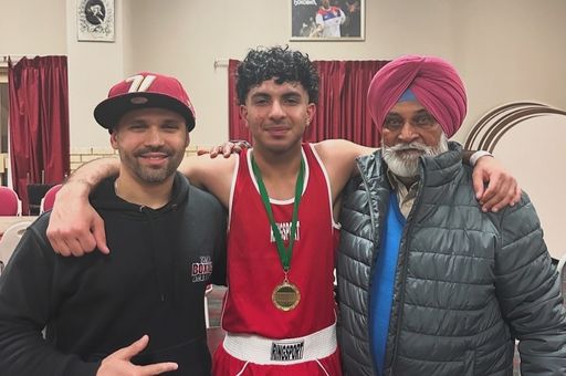 Coach Rufo with one of his winning fighters