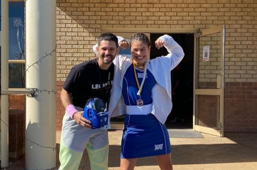 Coach Rufo with one of his winning fighters